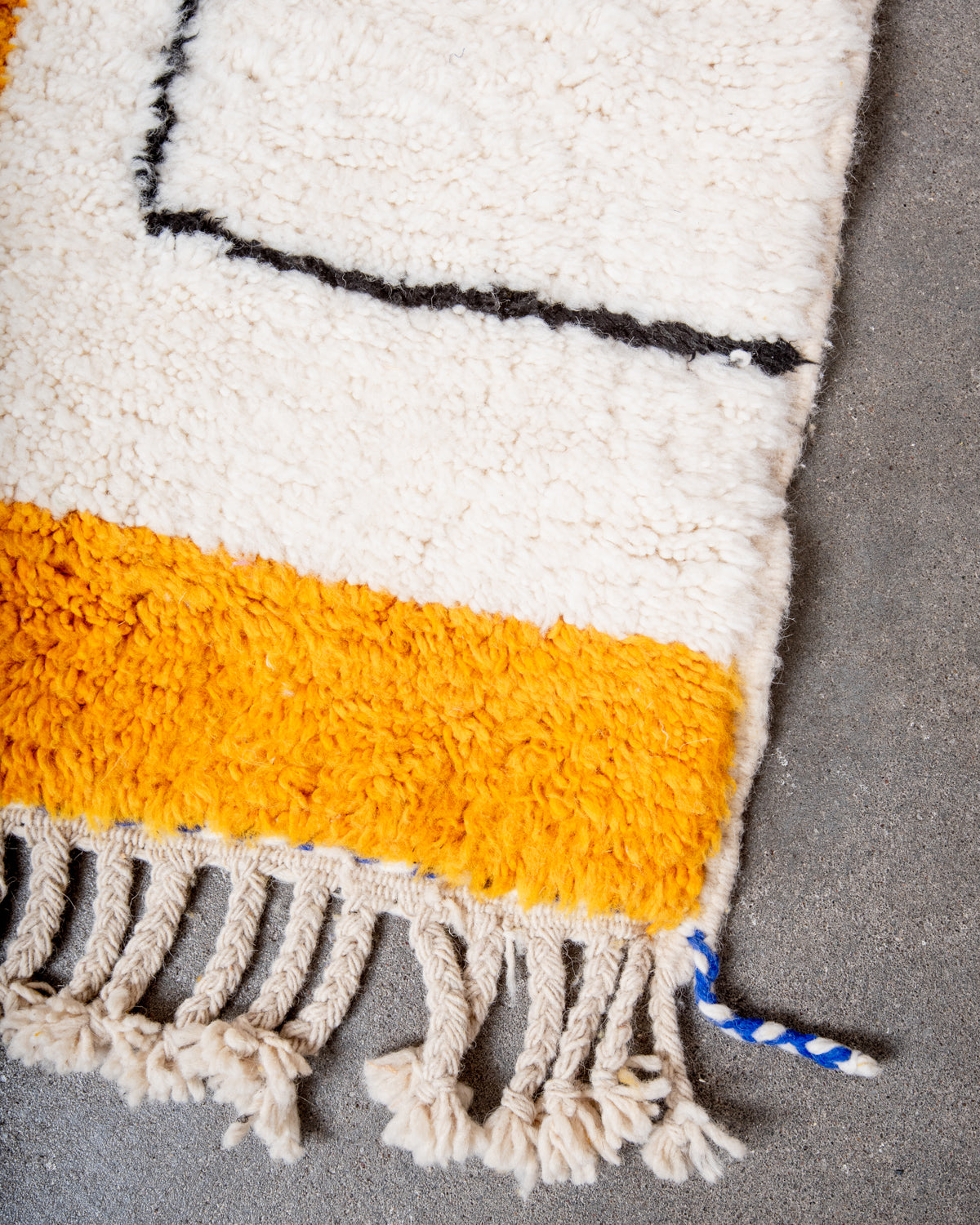 Modern, designer, handcrafted Berber rug from Morocco. Beniourain carpet with beautiful colours and patterns and fluffy wool texture.